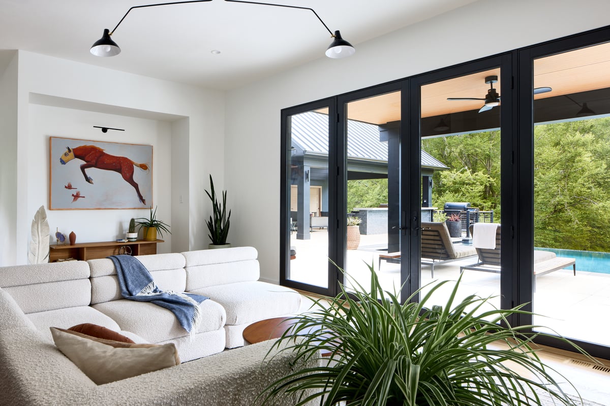 open concept home remodel in mclean va with large windows for natural light