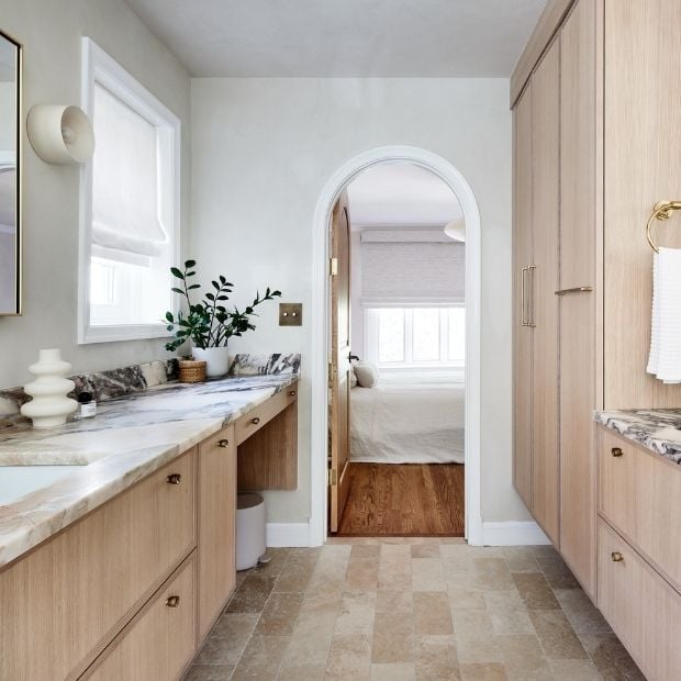 master bathroom remodel with light wood cabinetry and marble counter tops (1)