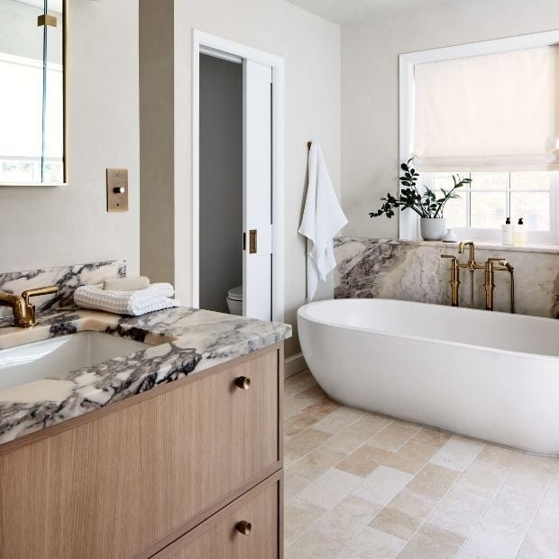 master bathroom renovation in bethesda md with free standing tub and marble counters (1)